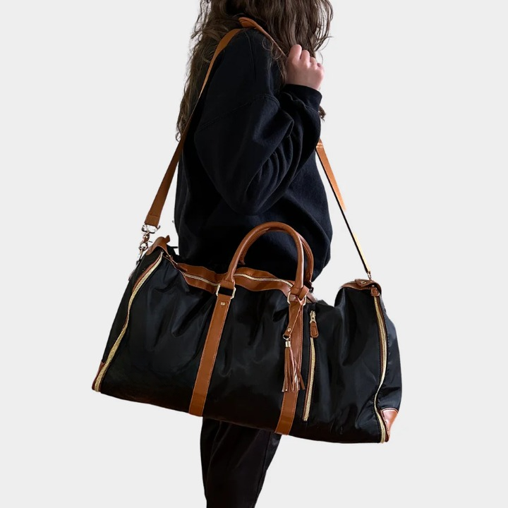 Compact garment duffel bag, ideal carry-on luggage for wrinkle-free clothes on weekend or business travel.
