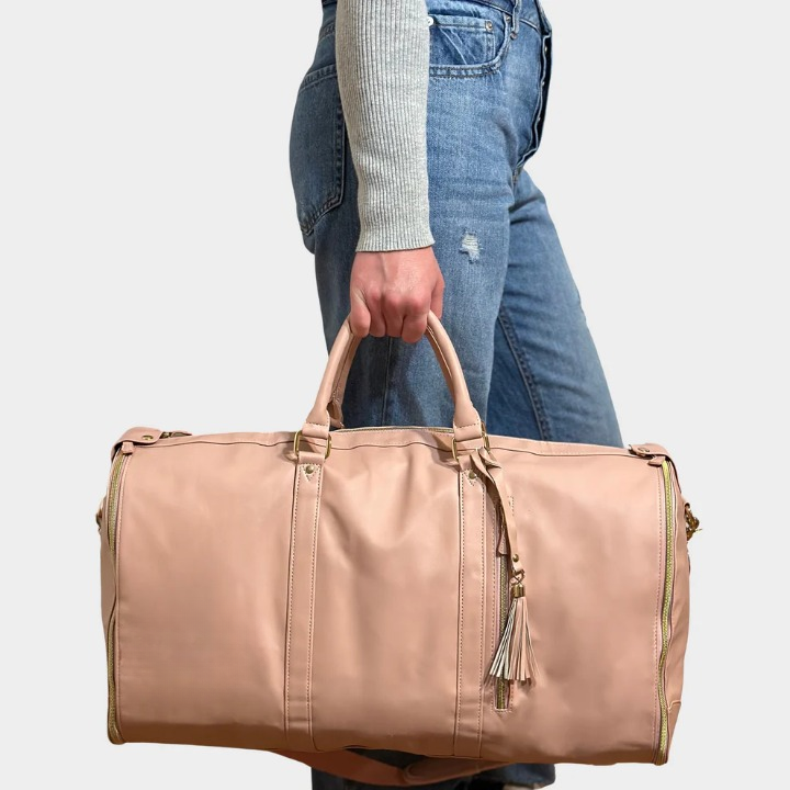 Wrinkle-free travel garment bag that converts to a duffel, ideal for suits and dresses on the go.