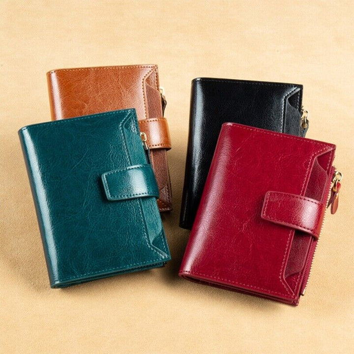 Compact RFID blocking leather wallet for women, front view.
