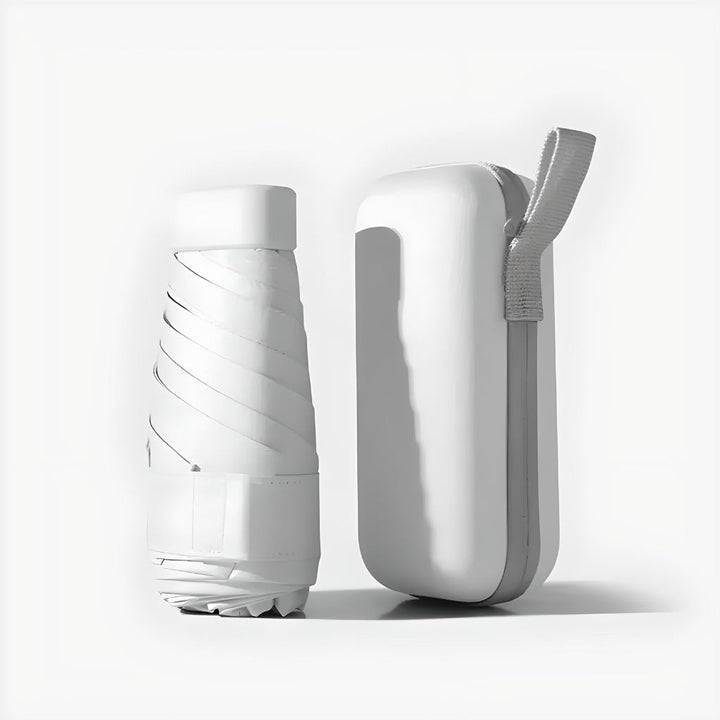 Durable compact umbrella in its waterproof case, perfect for travel and everyday carry.