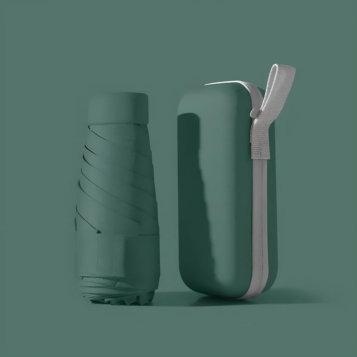 Close-up of a compact travel umbrella, showcasing its durable windproof design and portability.