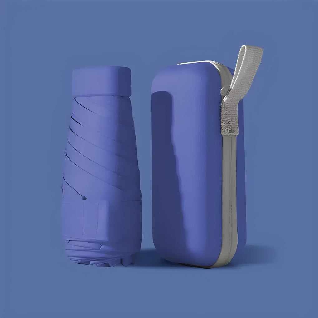 A lightweight travel umbrella unfurled, demonstrating its windproof construction and coverage.