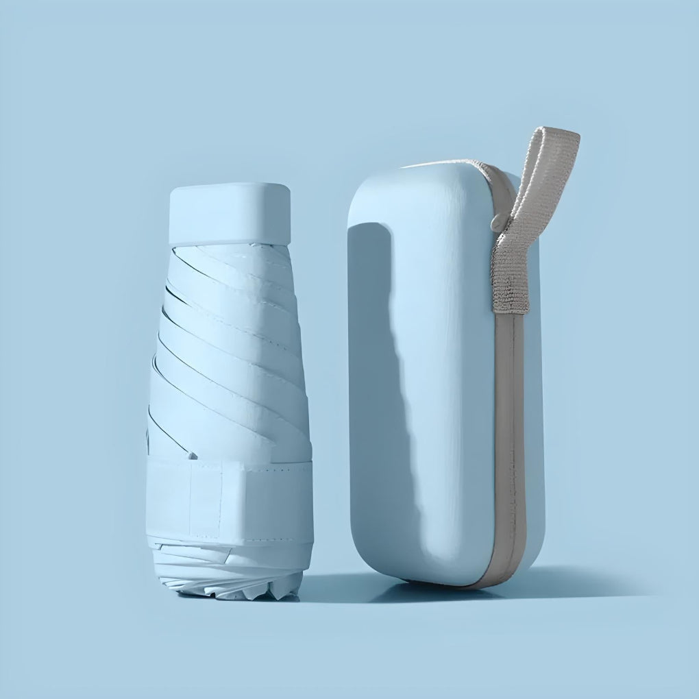 Compact travel umbrella packed neatly into its waterproof case, ready for any weather.