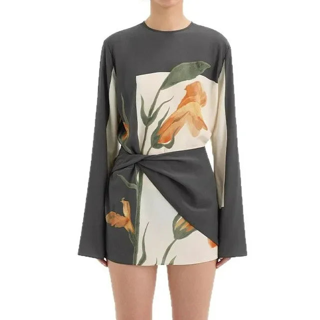 Shop the Constance floral twist mini dress, a versatile women's party dress.