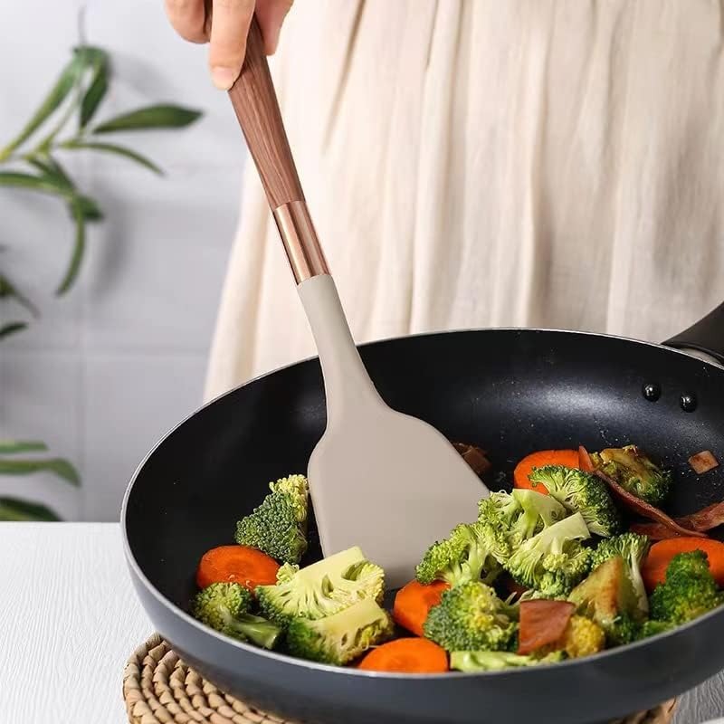 Heat-resistant, nonstick safe 10-piece silicone cooking utensil set with stylish wood-look handles.