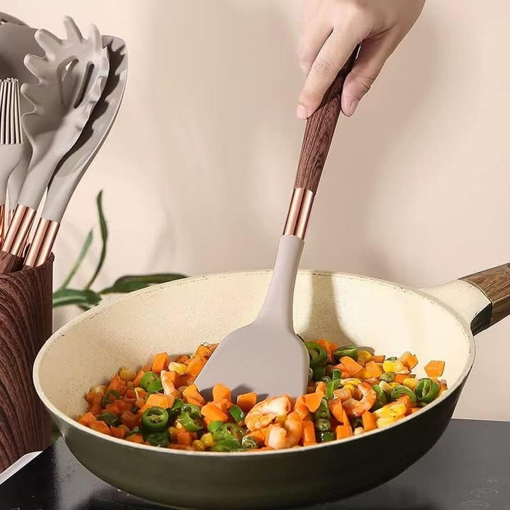 Versatile 10-piece modern silicone cooking and baking utensil set, featuring wood-look handles.