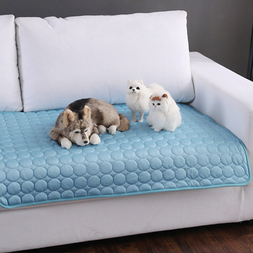 Portable pet cooling mat for dogs & cats. Washable summer pet accessory offering instant heat relief & comfort.