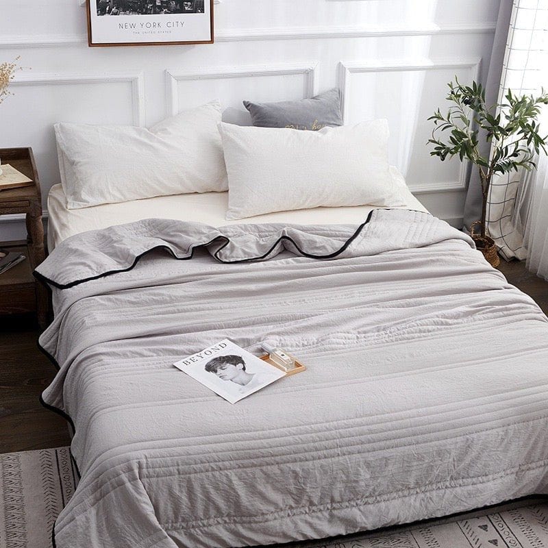 Soft, breathable cooling blanket designed for hot sleepers. Provides refreshing comfort for a cool summer sleep.