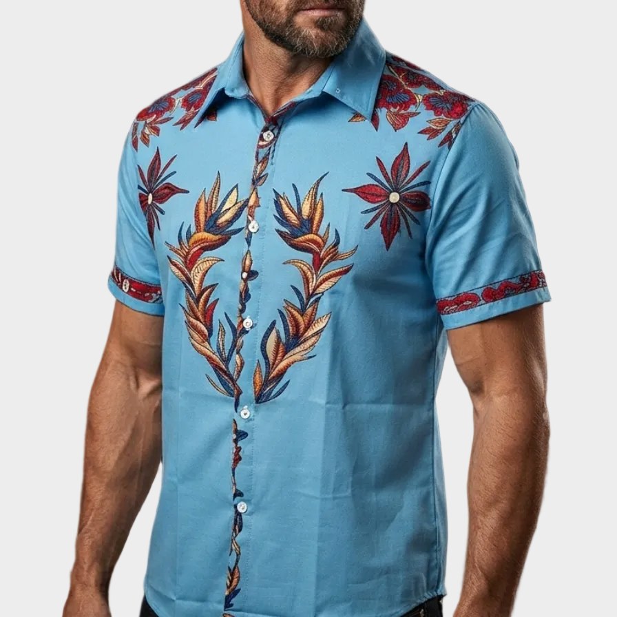 Modern men's casual western shirt with a striking floral print. Short sleeves, relaxed fit for a cool summer vibe.