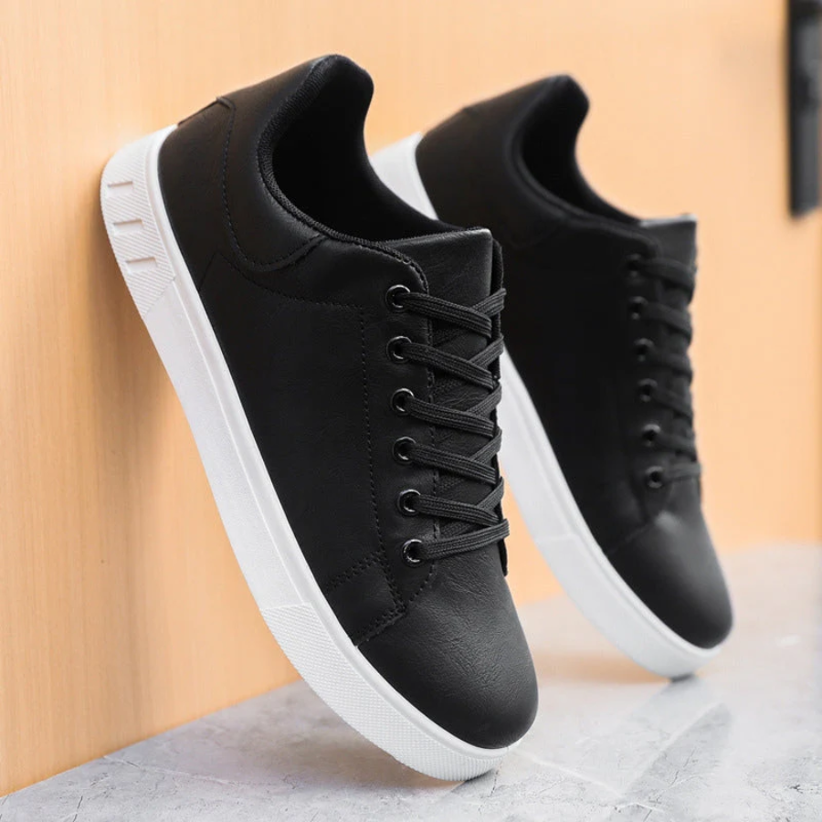 Men's black orthopedic lace-up sneakers for supportive everyday comfort. Ideal casual walking shoes.