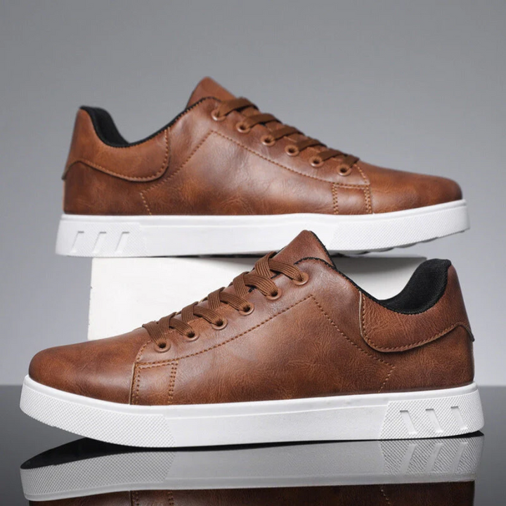Versatile black low-top men's orthopedic lace-up sneakers, providing comfort for casual walking & daily style.