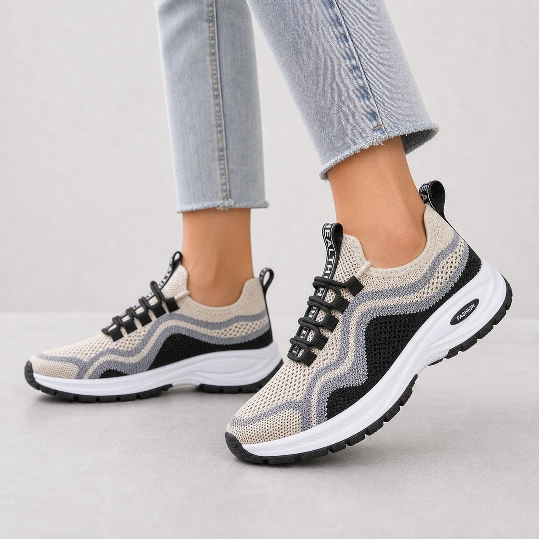 Cushioned women's lace-up walking shoes, perfect for everyday activewear and comfort.