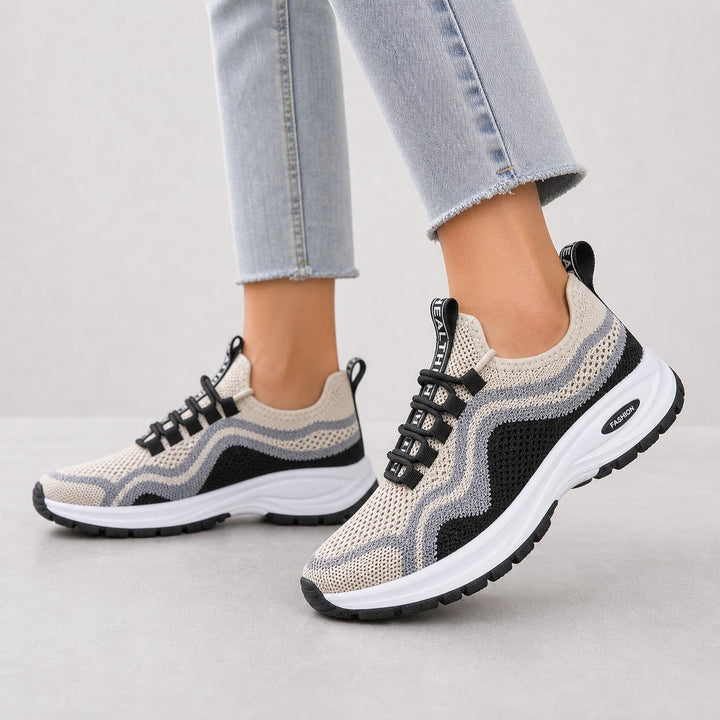 Cushioned women's lace-up walking shoes, perfect for everyday activewear and comfort.