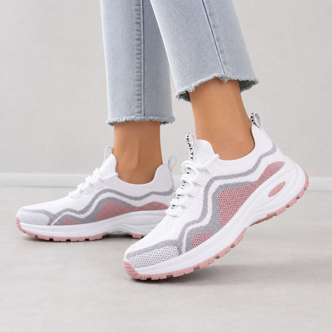 Woman wearing supportive lace-up walking shoes, ideal for active and casual everyday wear.