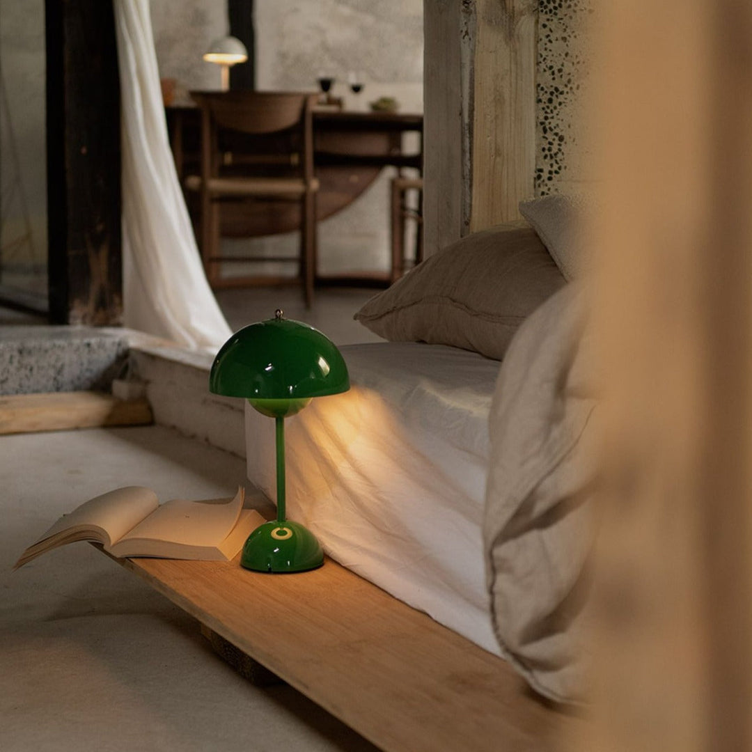 Elegant cordless retro LED table lamp; provides portable, dimmable accent lighting for home decor.