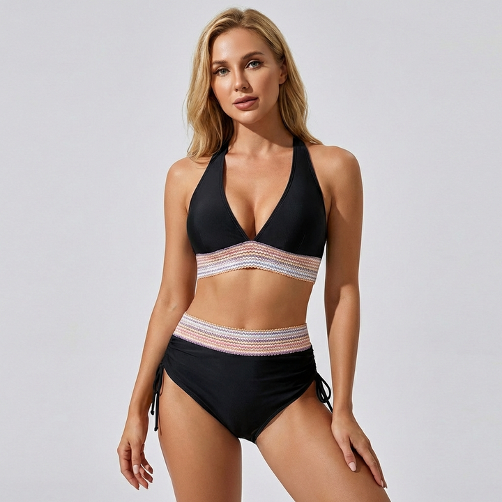Women's high-waisted tummy control bikini swimsuit, flattering design for beach and pool. Summer swimwear.