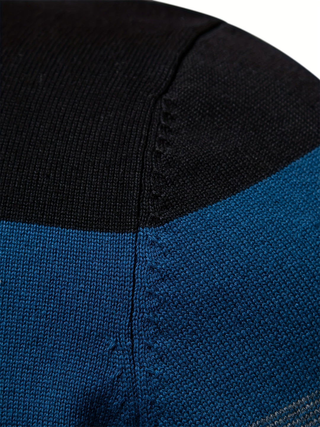 Stylish men's cotton knitted half-zip pullover sweater with a striking color block design for casual wear.