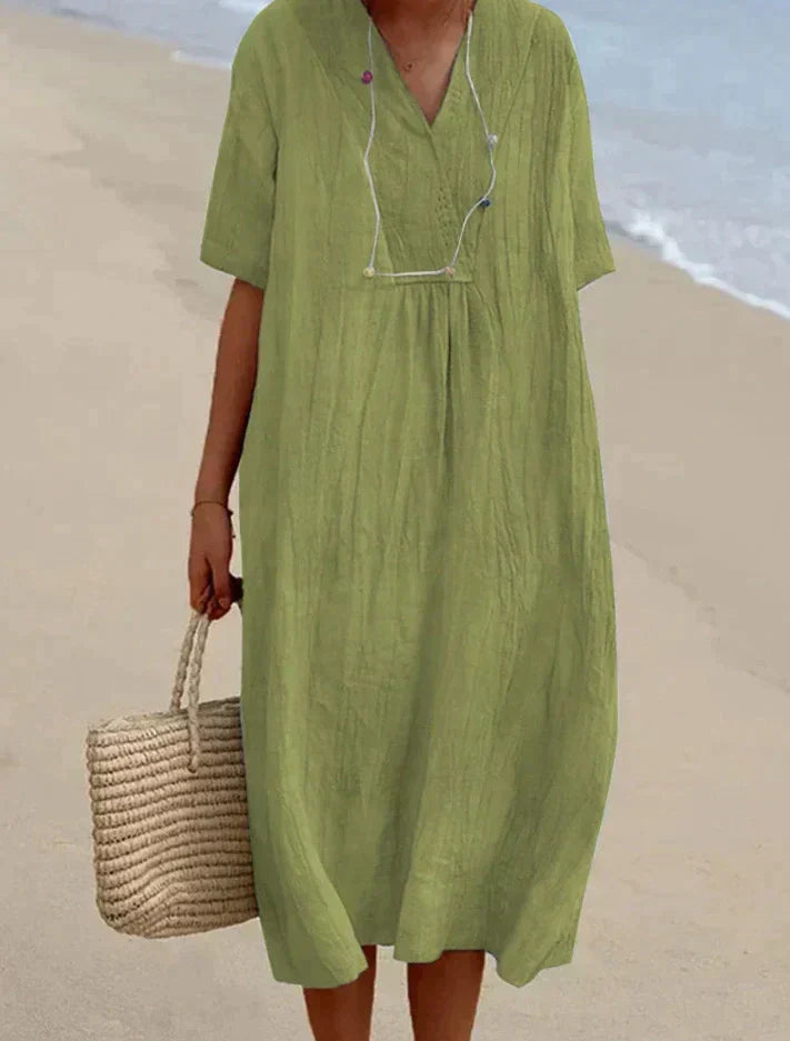 Relaxed fit sleeveless V-neck cotton linen summer midi dress for warm days, beach, or everyday wear.