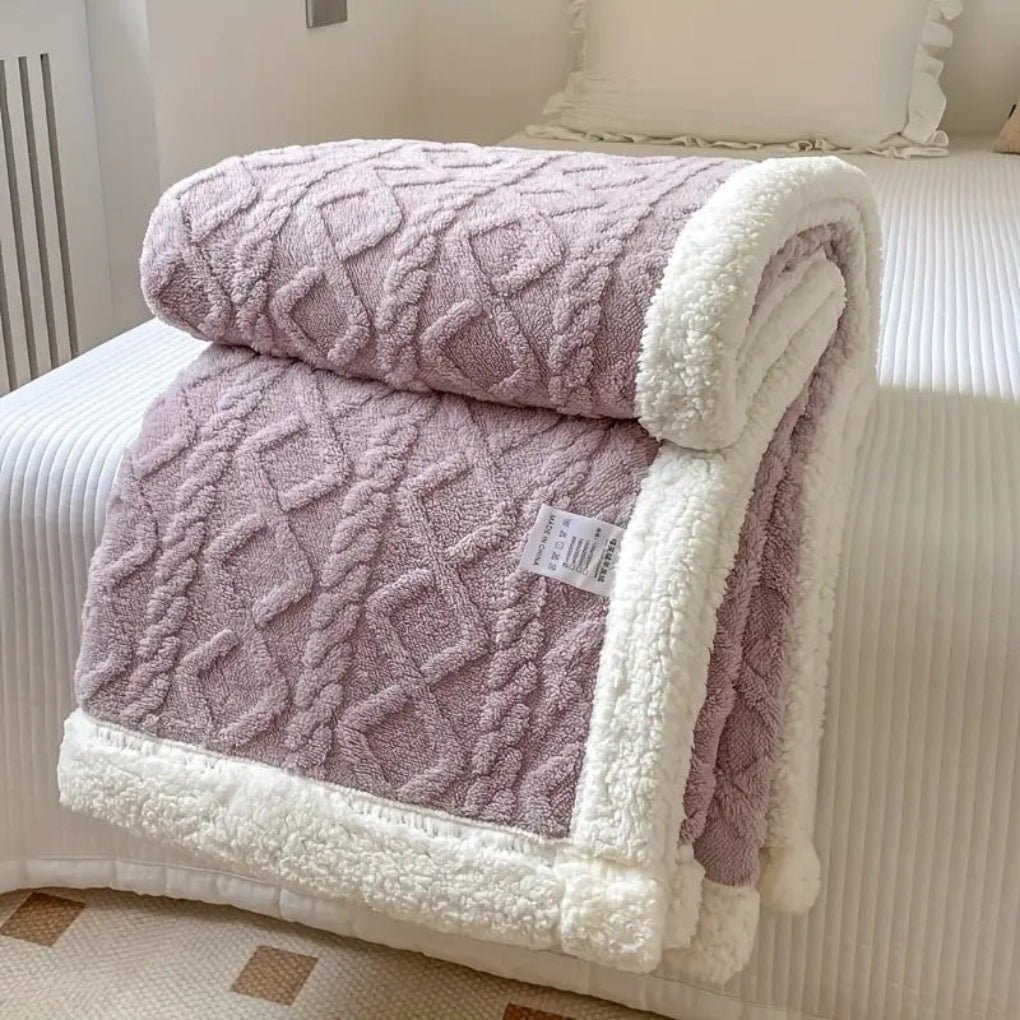 Cozy diamond knit sherpa throw blanket, plush and reversible for ultimate comfort.