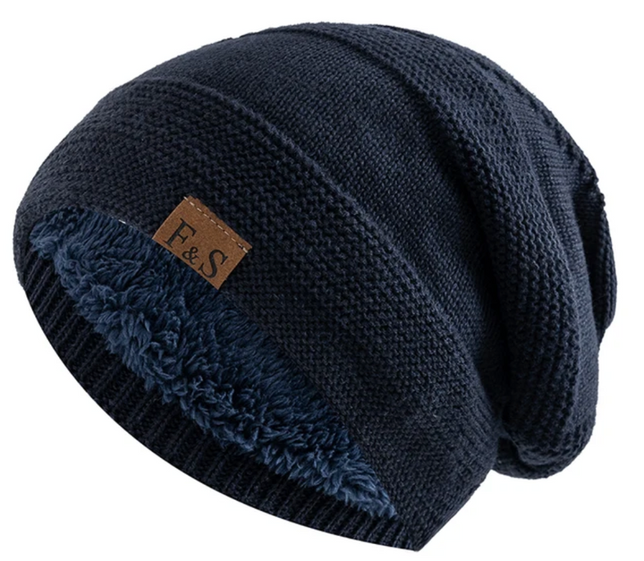 Close-up of a soft fleece lining inside a cozy winter beanie hat.