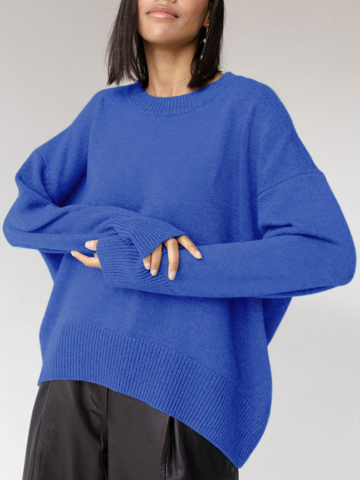 The relaxed silhouette of a one-size-fit oversized crewneck sweater for ultimate comfort.