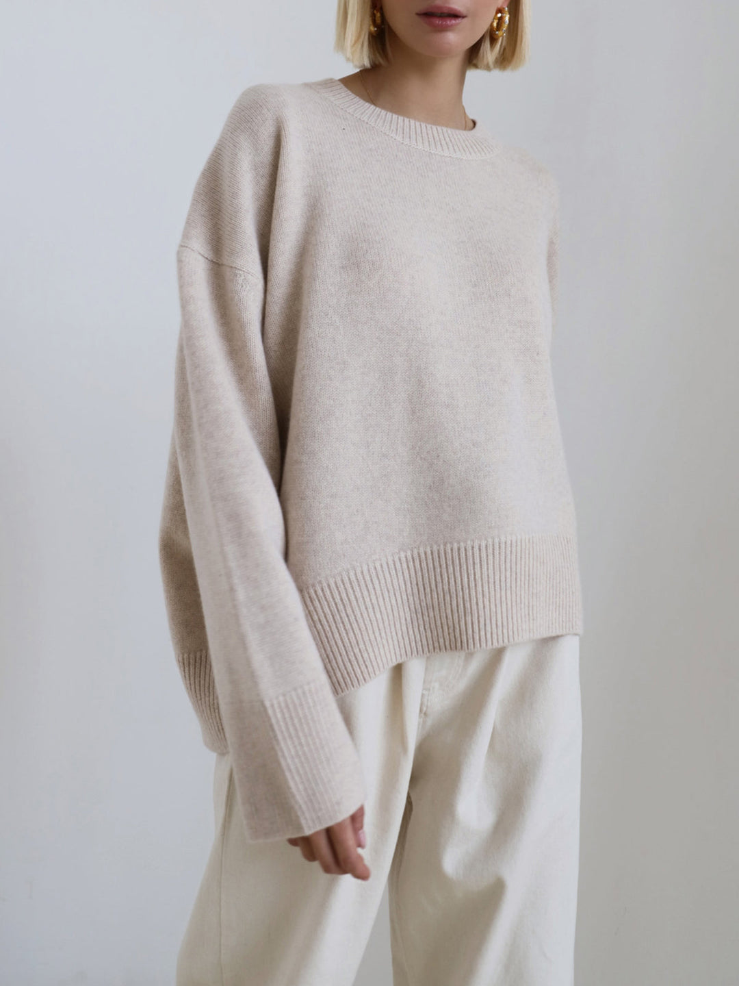 Versatile oversized sweater styled with jeans for an effortless casual outfit.