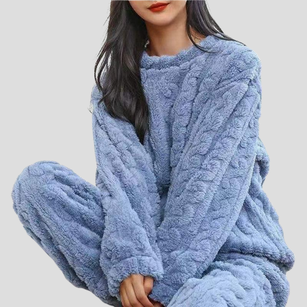 Cozy women's fleece pajama set. Soft, comfortable one-size loungewear, perfect for winter sleepwear.