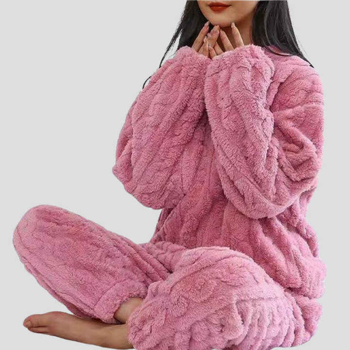 Plush women's fleece pajamas. Enjoy soft, comfortable, and cozy one-size sleepwear for ultimate relaxation.