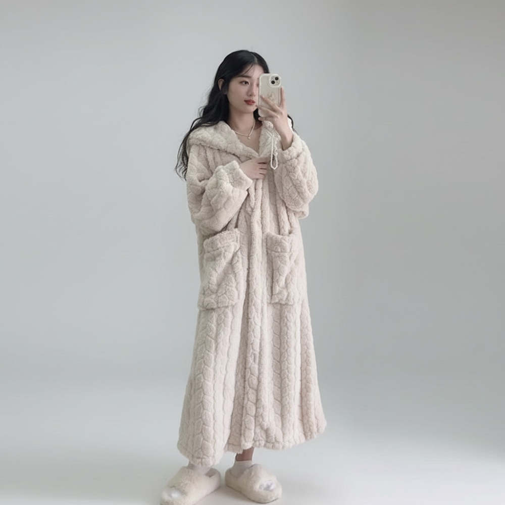 Stylish hooded robe for women, perfect for relaxing and lounging at home.