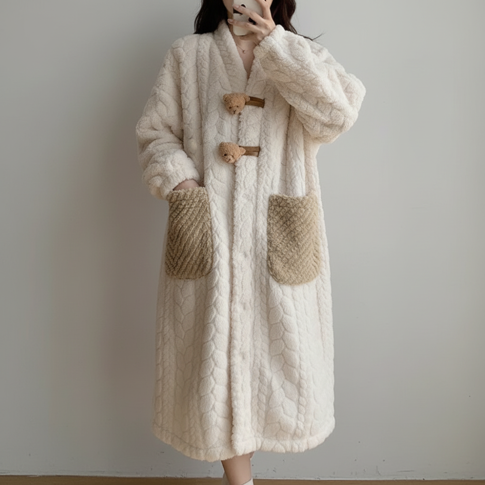 Women's hooded bathrobe designed for maximum coziness and warmth.