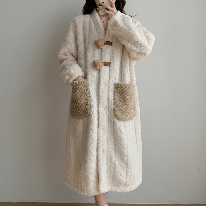Women's hooded bathrobe designed for maximum coziness and warmth.
