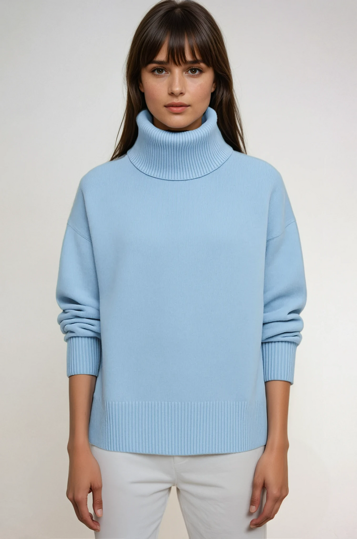 Cozy women's oversized turtleneck sweater in a warm knit, perfect for winter fashion.