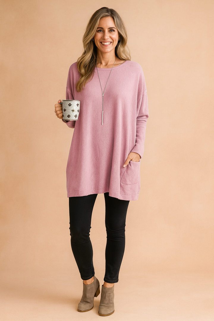 Long sleeve casual top for women, featuring a comfortable oversized fit and stylish pocket.