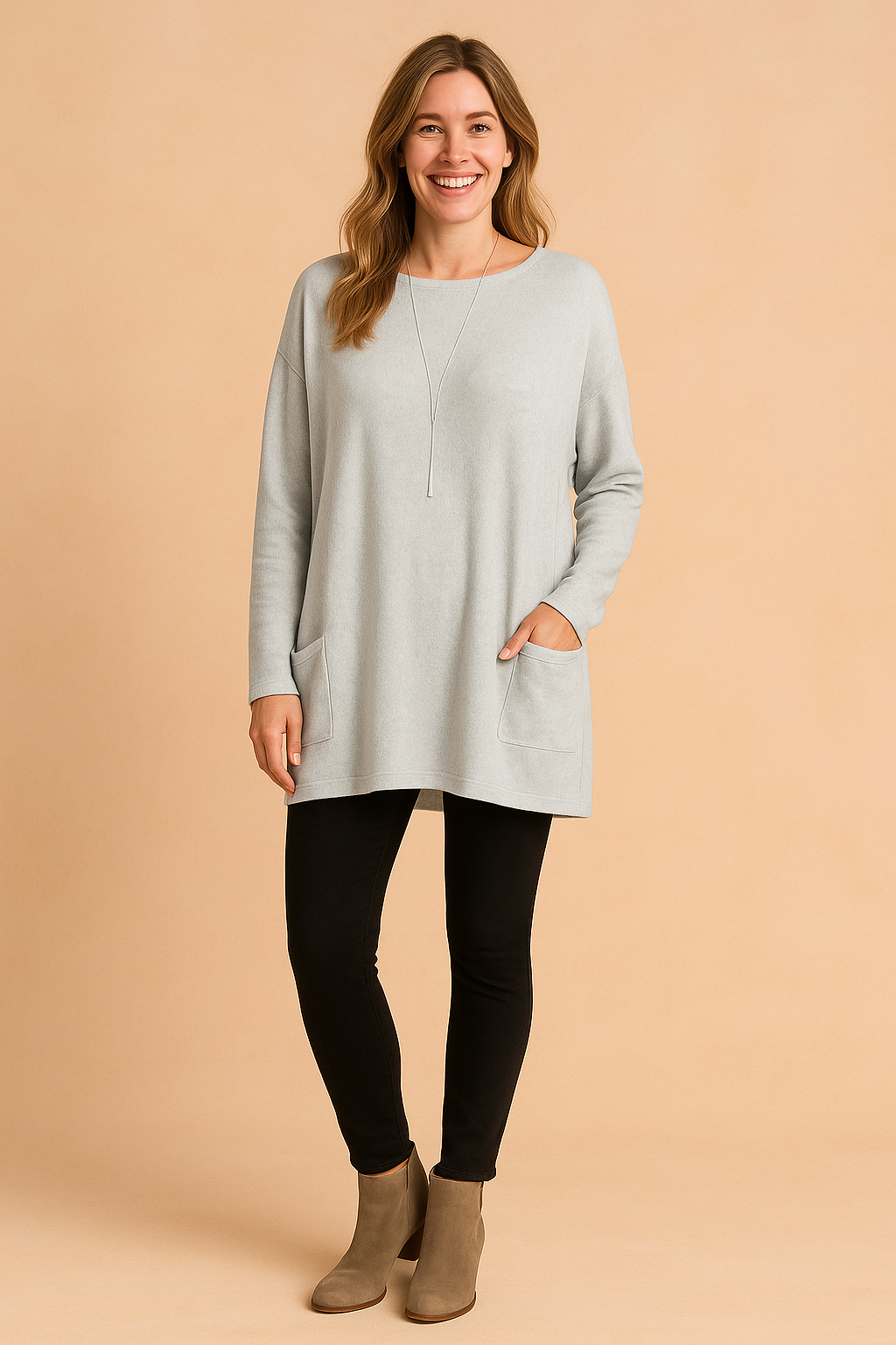Stylish long sleeve womens sweater featuring a relaxed, oversized fit and pocket detail.