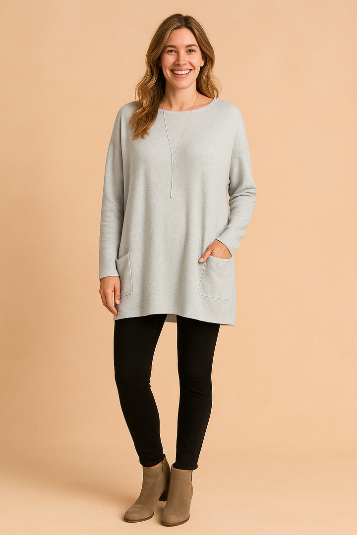 Stylish long sleeve womens sweater featuring a relaxed, oversized fit and pocket detail.