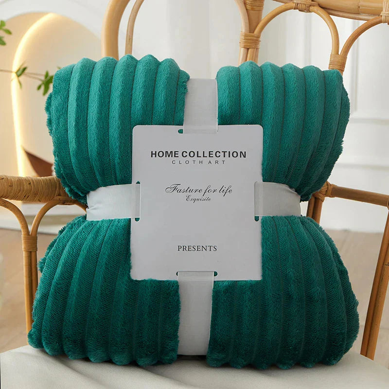 Detailed view of the wide stripe pattern on the CozyStripe warm fleece blanket.