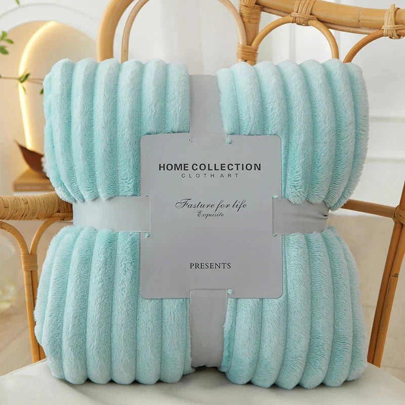 The CozyStripe fleece blanket: a cozy addition to your home decor with its stripes.