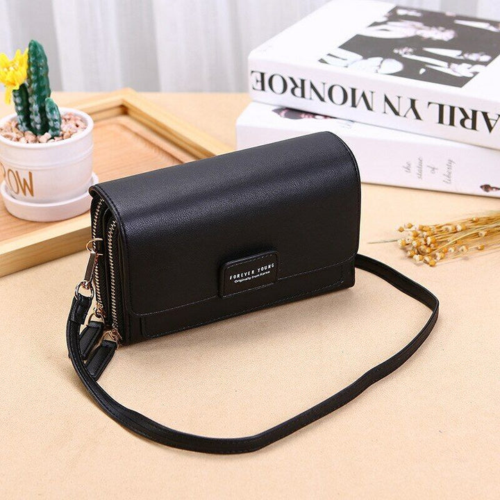 Stylish multi-pocket PU leather bag, a versatile everyday essential for women.