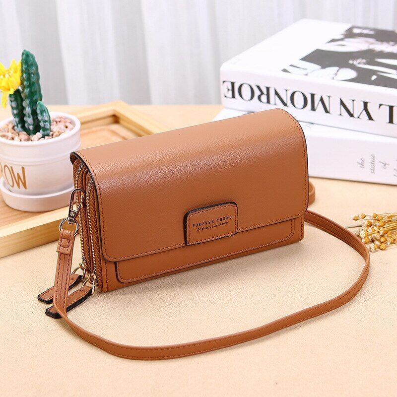 Women's PU leather crossbody bag, featuring multiple pockets for optimal organization.