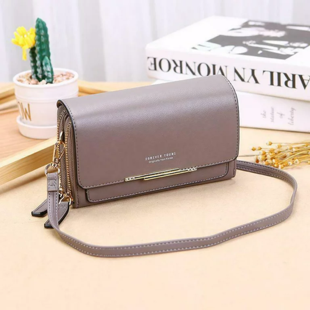 Travel-friendly women's PU leather crossbody bag with multiple compartments.