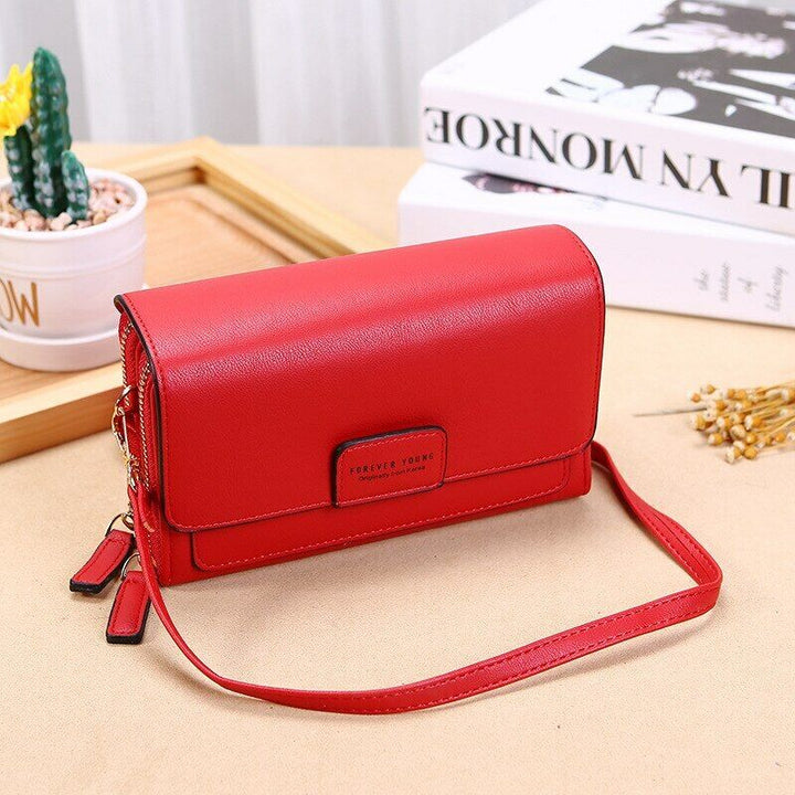 Practical PU leather shoulder bag for women, offering multi-pocket organization.