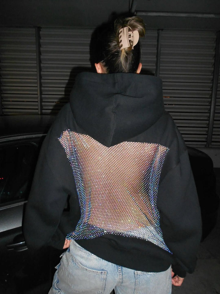 Chic women's dazzling crystal mesh open back hoodie, perfect for a night out.