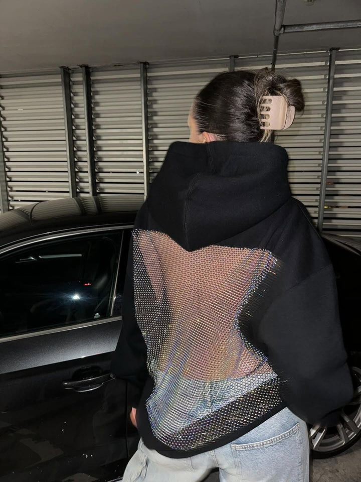 Comfortable yet chic crystal-mesh open back hoodie, a must-have party top.