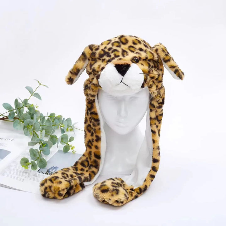Plush rabbit moving ears hat, playful interactive accessory for children.