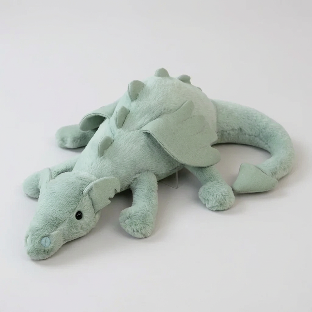 Cute, soft green dragon plush toy for kids, perfect for snuggles and imaginative play. Adorable stuffed animal gift.