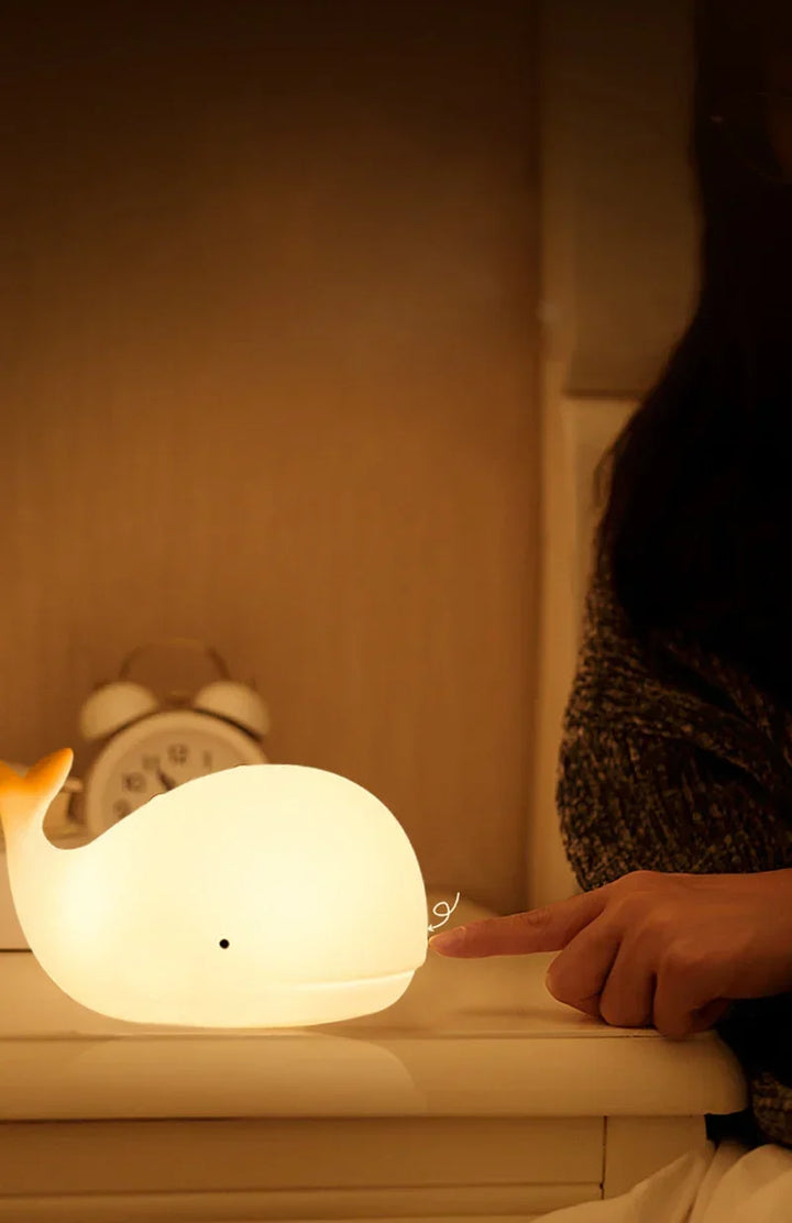 GlowWhale: Adorable LED whale night lamp, ideal children's gift & nursery decor, offers calming multi-color light.