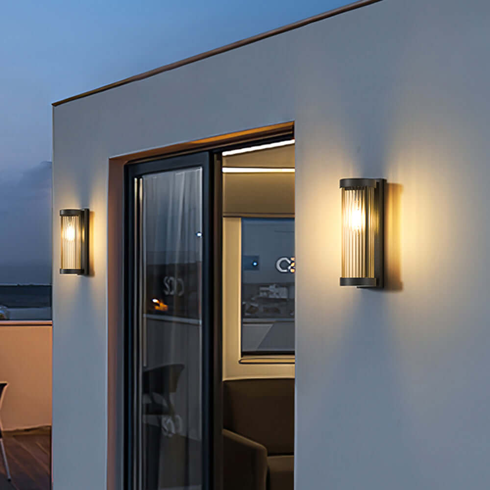 Modern outdoor wall light, solar & hardwired, sleek design for patio & garden.