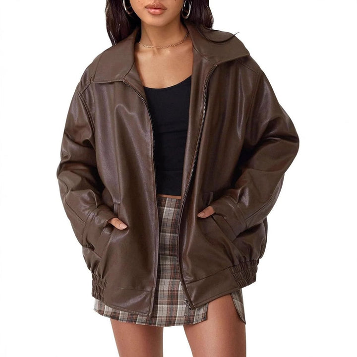 Women's black leather oversized bomber jacket, perfect for trendy fall fashion and street style.