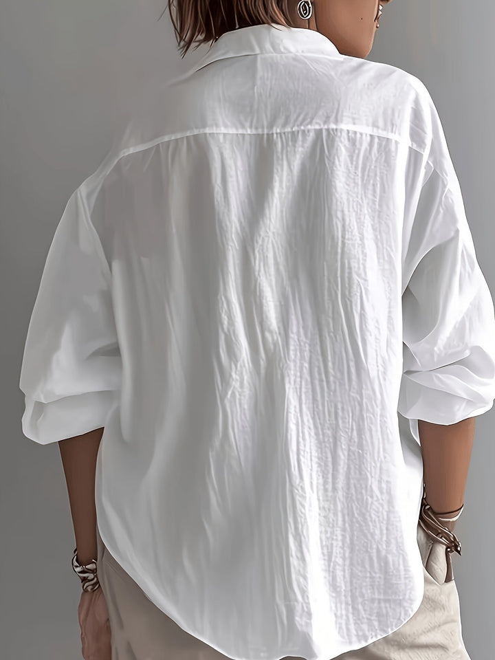 Effortless women's collared blouse. Relaxed fit, long sleeve for stylish all-day comfort.