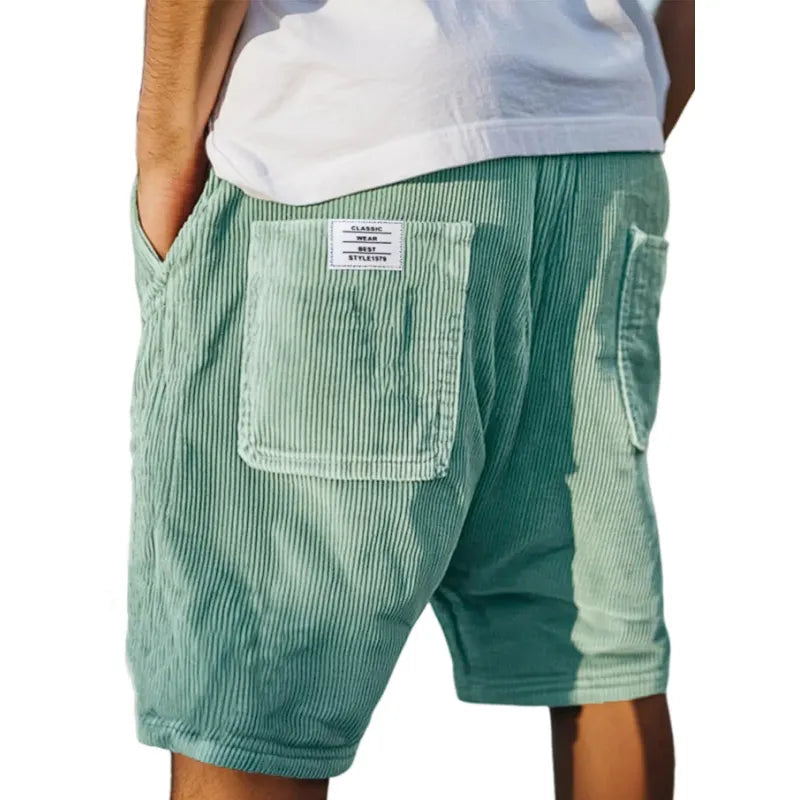 Comfortable men's tailored shorts with a subtle texture, great for modern men's fashion and summer wear.